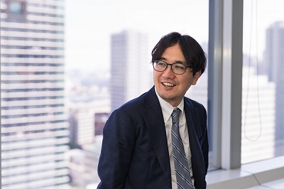 写真 マネージング・コンサルタント 塙